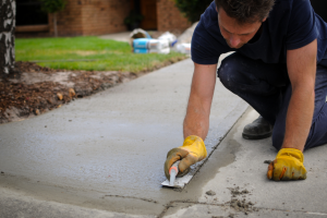 making a statement with stamped concrete driveways